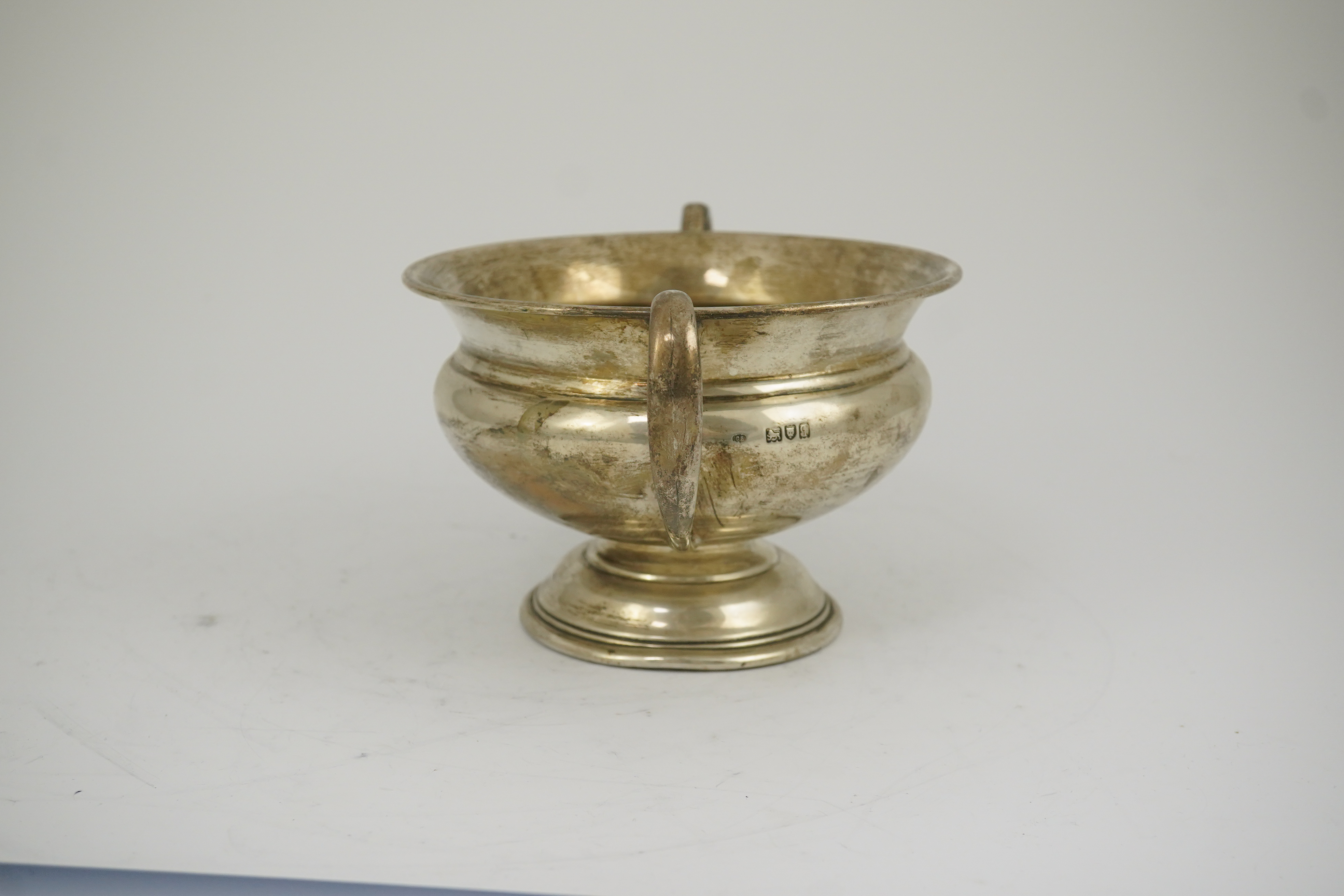 A George V silver two handled pedestal bowl, by Charles Edwards